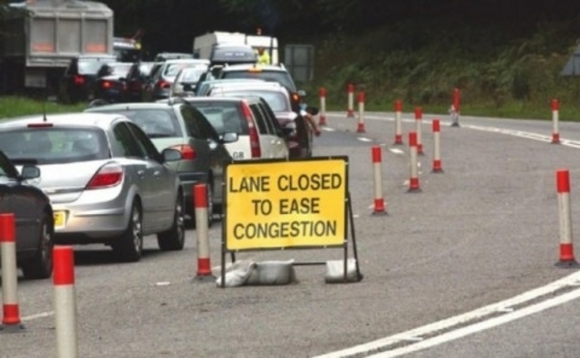 110938-large-03_lane-closed-congestion_useless-road-signs.jpg